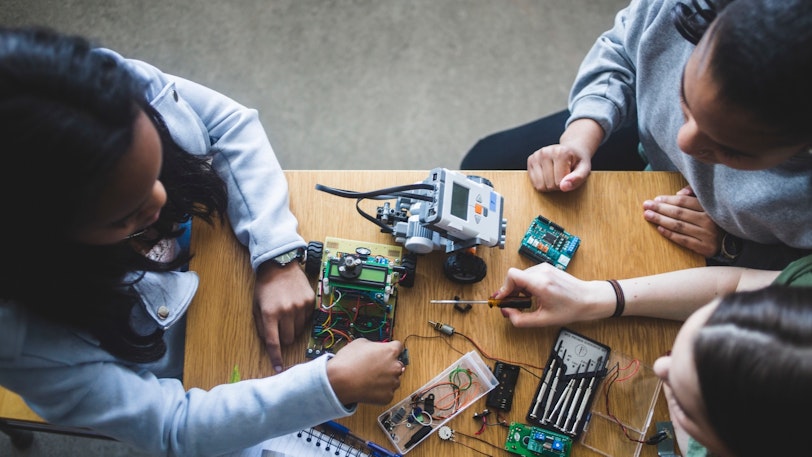 Standards Comp Thinking Stock Students with robots 2 1055843962